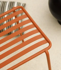 Gaby - Oranje metalen leunstoel