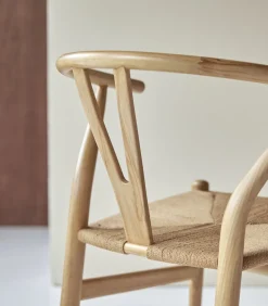 Stoel van licht massief teakhout met vlechtwerk Blaise