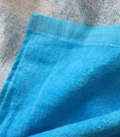 Strandlaken met fluwelen opdruk 100% katoen, OM ÉQUIPE