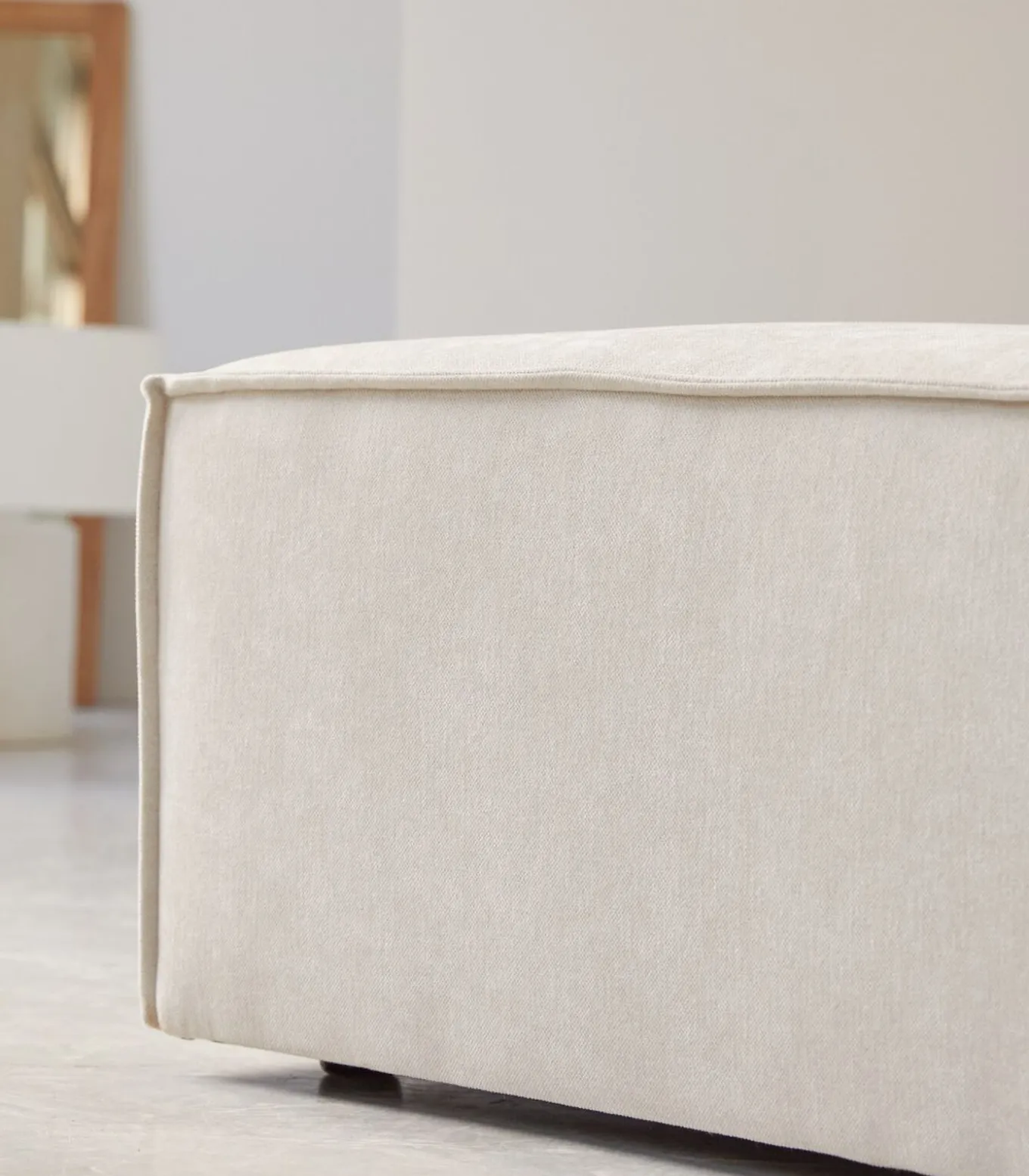 Voetenbank in beige stof Dario, 1-zit